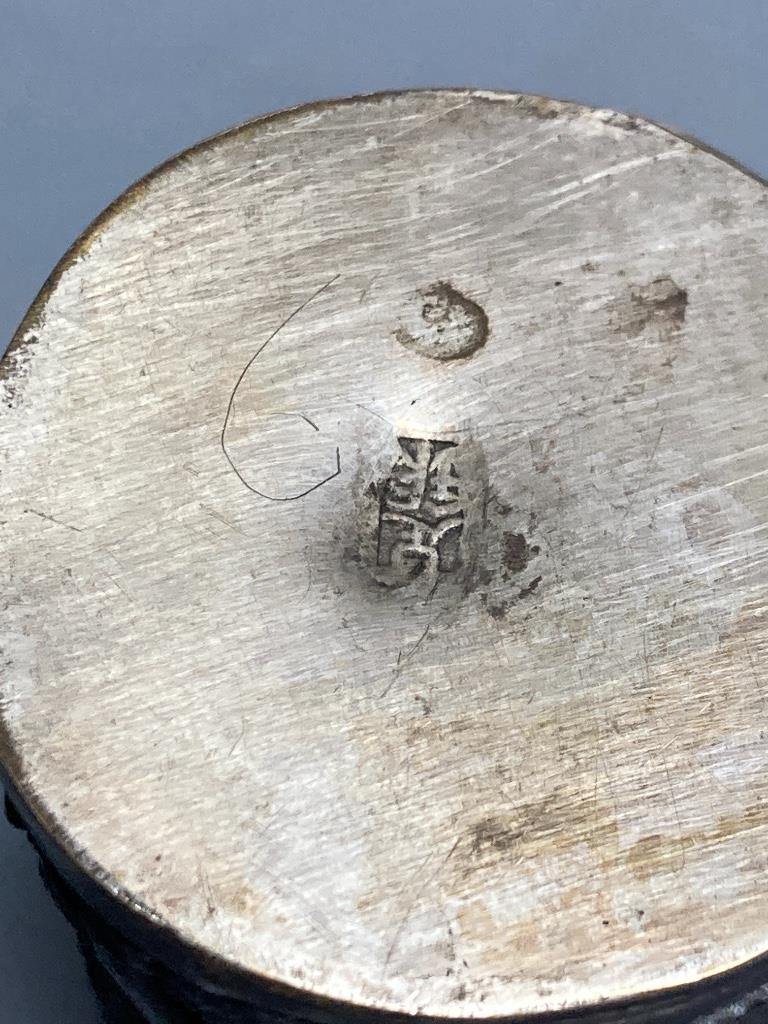 A Chinese white metal 'dragon' jar and cover, length 7cm